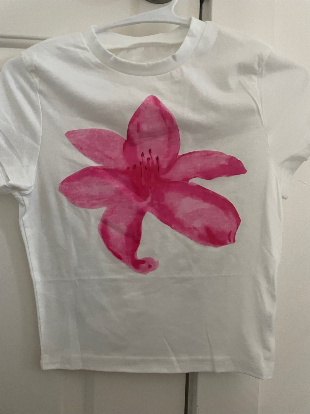 White Baby Tee with Pink Flower Graphic